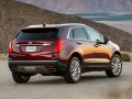 The first-ever 2017 Cadillac XT5 is a comprehensively upgraded luxury crossover and the cornerstone of a new series of crossovers in the brandÃ¢â¬â¢s ongoing expansion. The XT5 further builds on CadillacÃ¢â¬â¢s trademark attributes of distinctive, sophisticated and agile vehicles. Pictured: 2017 Cadillac XT5 Platinum; Exterior paint shown in in Red Passion Tintcoat; Interior environment shown in Maple Sugar with Jet Black accents and Satin Rosewood wood trim.
