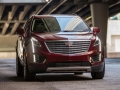 The first-ever 2017 Cadillac XT5 is a comprehensively upgraded luxury crossover and the cornerstone of a new series of crossovers in the brandÃ¢â¬â¢s ongoing expansion. The XT5 further builds on CadillacÃ¢â¬â¢s trademark attributes of distinctive, sophisticated and agile vehicles. Pictured: 2017 Cadillac XT5 Platinum; Exterior paint shown in in Red Passion Tintcoat; Interior environment shown in Maple Sugar with Jet Black accents and Satin Rosewood wood trim.